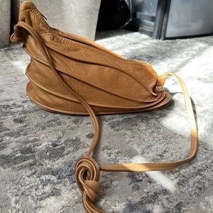 Asymmetrical vintage tan leather shoulder bag